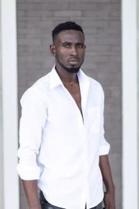 portrait-young-man-standing-against-white-wall_1048944-403590